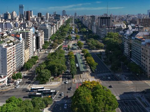 an aerial view of a city with tall buildings