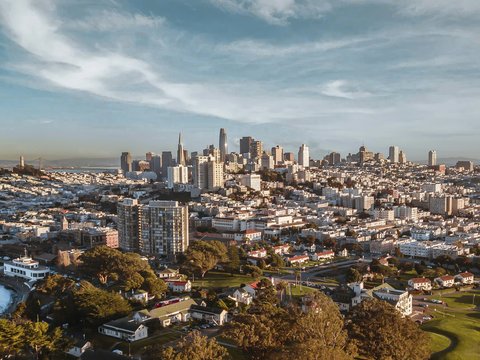 city skyline under blue sky during daytime