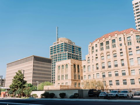 a row of tall buildings next to each other