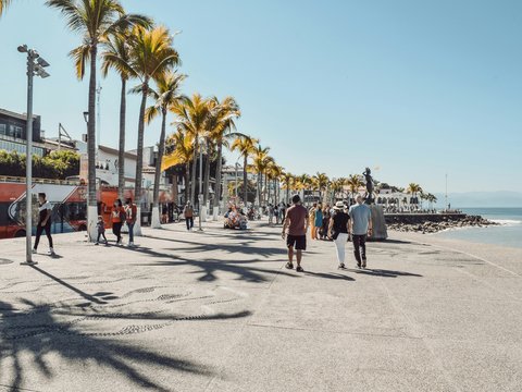 people walking on gray concrete road during daytime