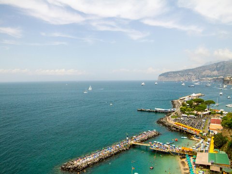 a view of a harbor with boats in the water