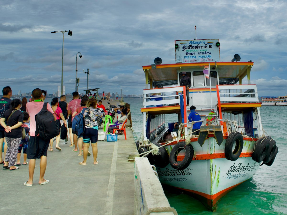 a boat is parked on the side of a dock
