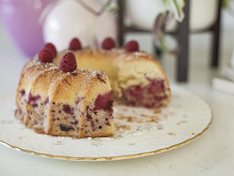 sliced cake on white ceramic plate