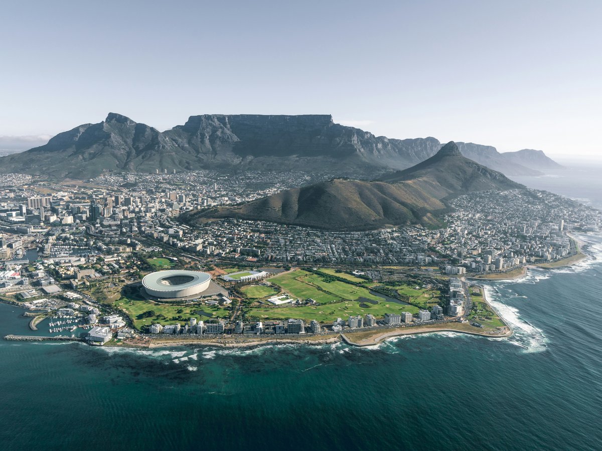 aerial view of city near mountain during daytime