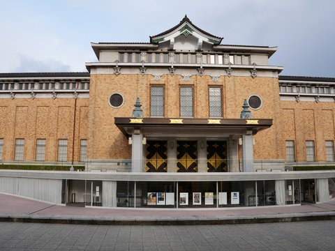a large building with a clock on the front of it