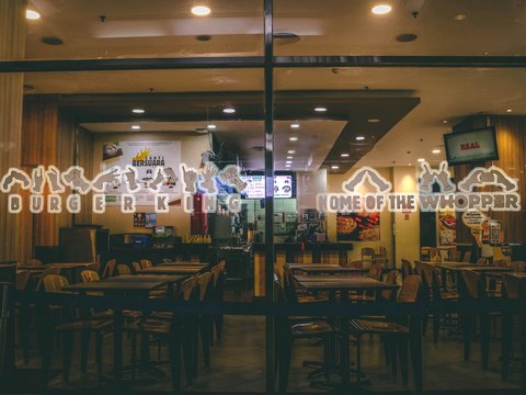 a restaurant with a large glass window that says china on it