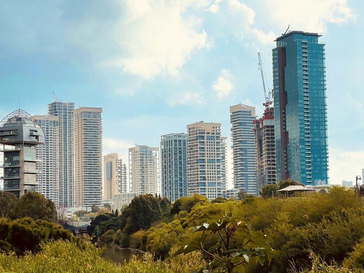 city skyline under blue sky during daytime