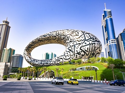 a large reflective sphere in a city