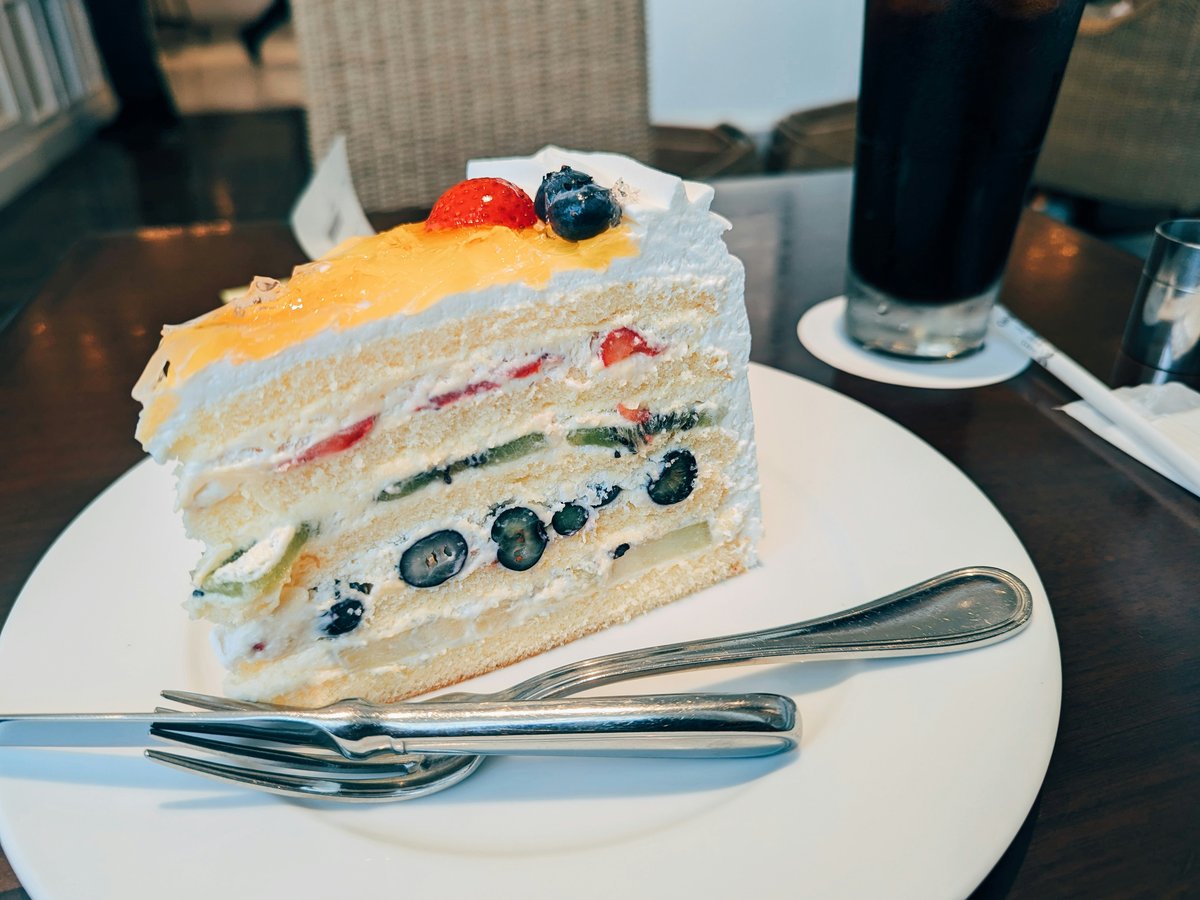 A piece of cake sitting on top of a white plate