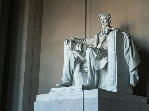 man in white robe statue