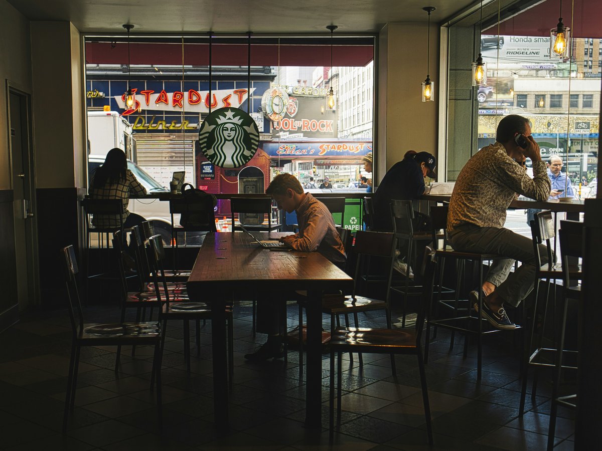 people sitting on chair in restaurant