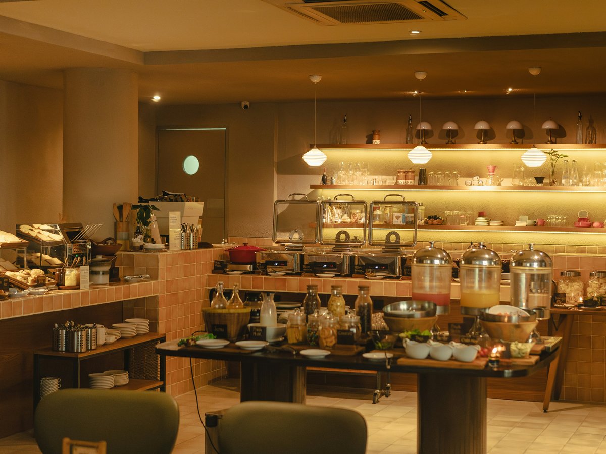 A hotel buffet with various food and drink options