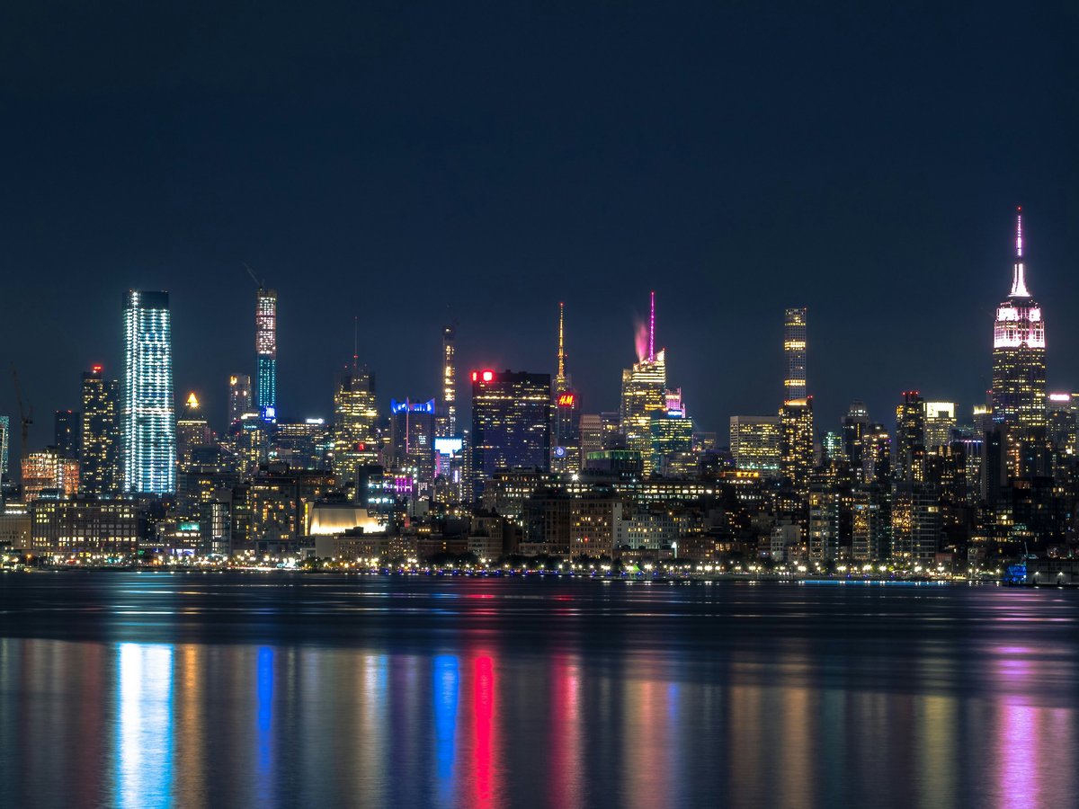 city skyline during night time