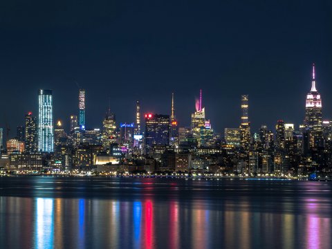 city skyline during night time