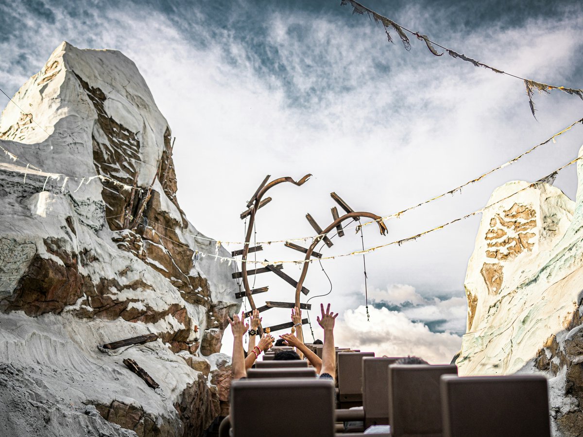 a group of chairs sitting in front of a mountain