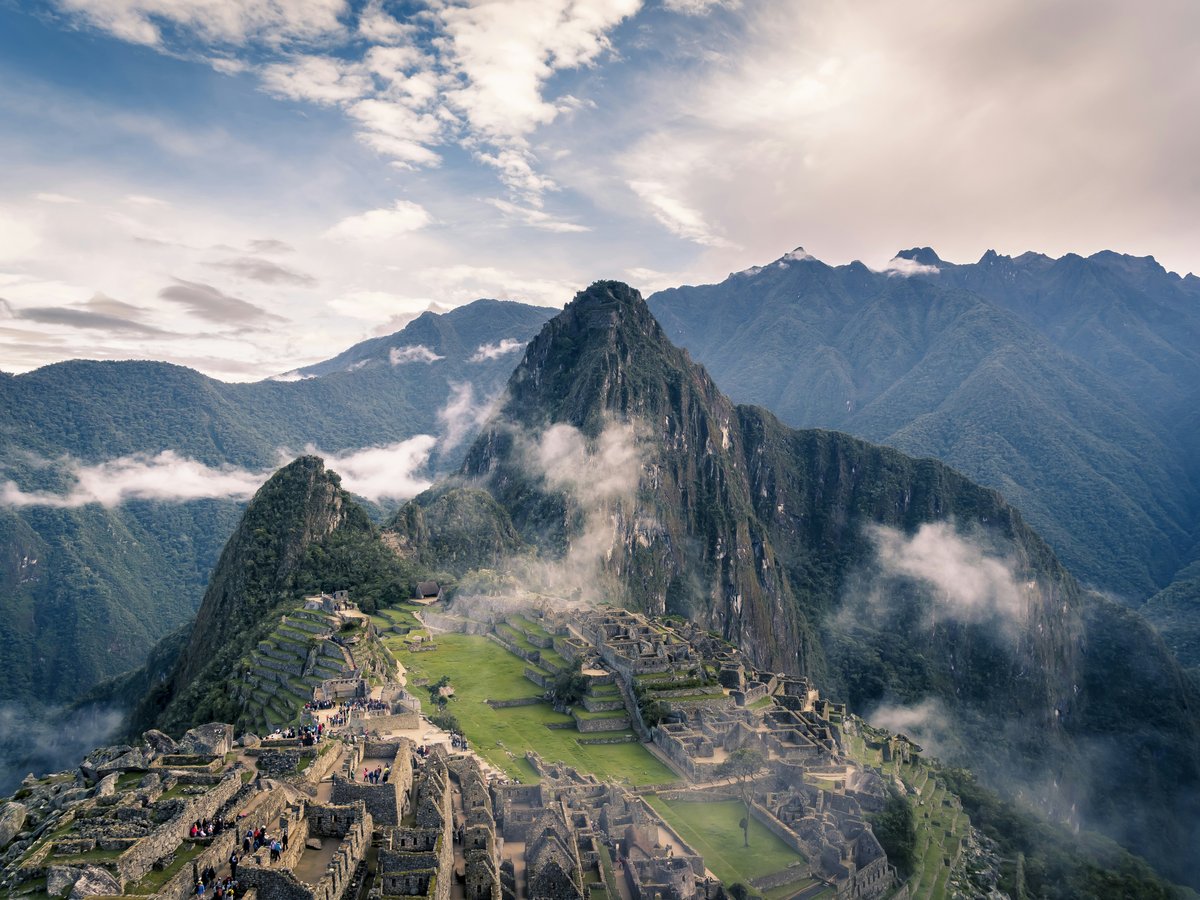 machu picchu ruins among misty mountains