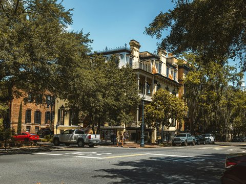 a street with cars parked on the side of it