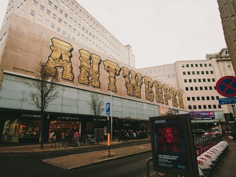 a street with a building on the side