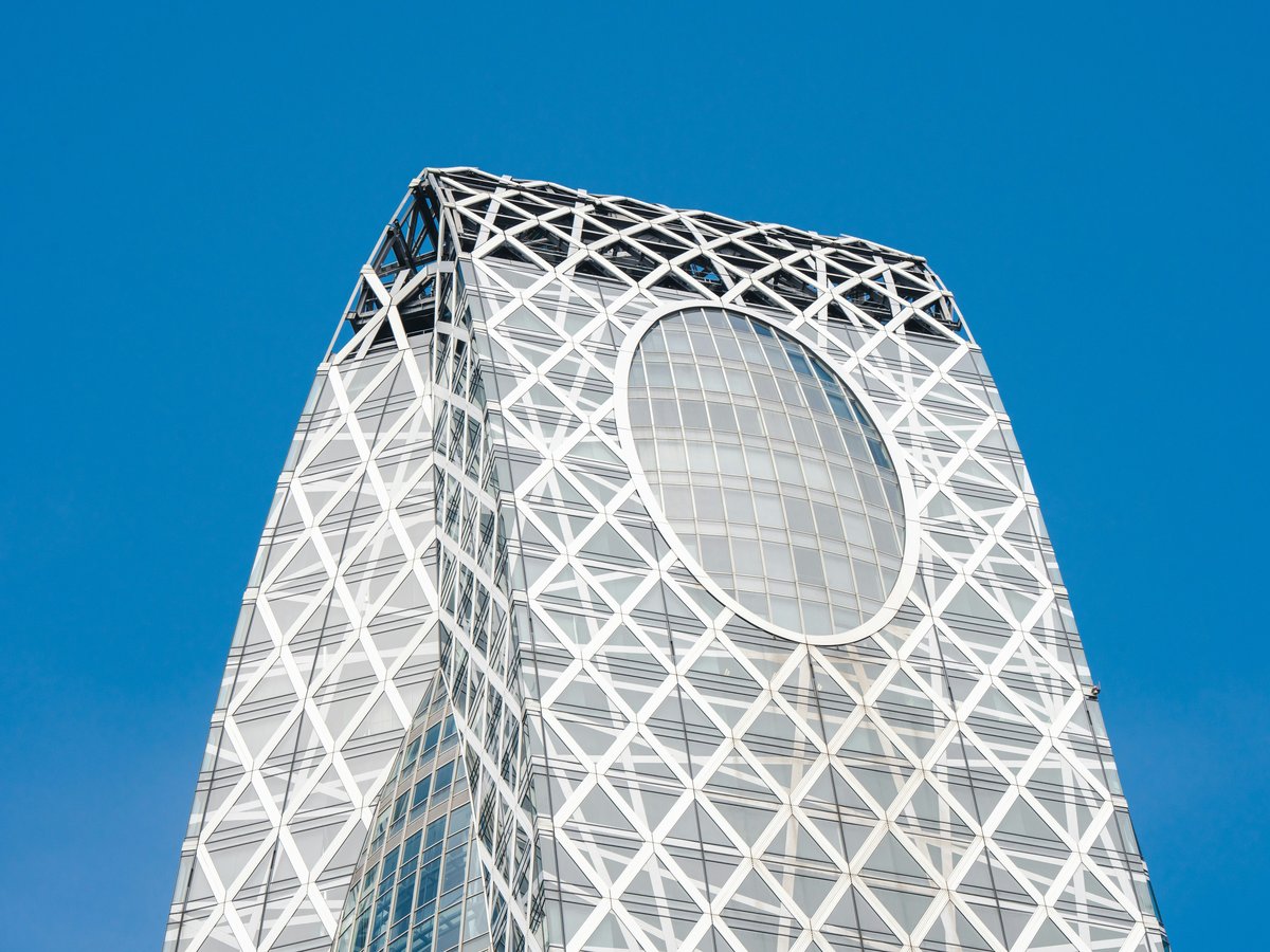 a very tall building with a circular window
