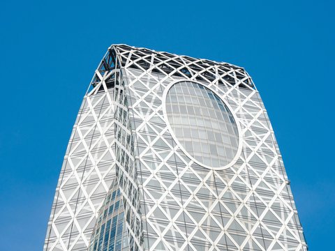 a very tall building with a circular window