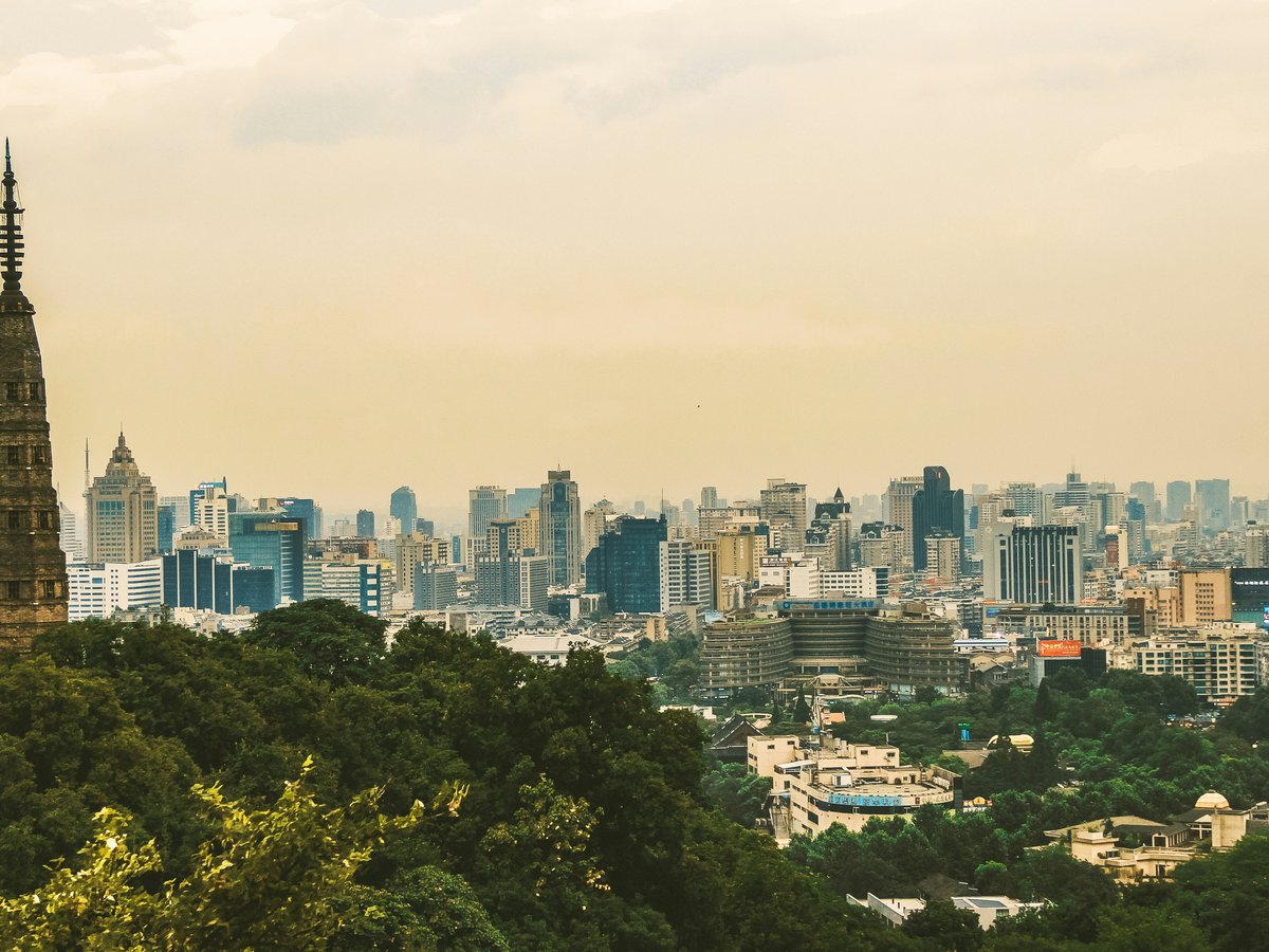 city with high rise buildings during daytime