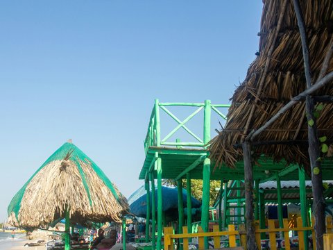 a group of straw huts