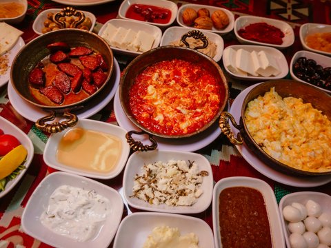 a bowl filled with different types of food on a table