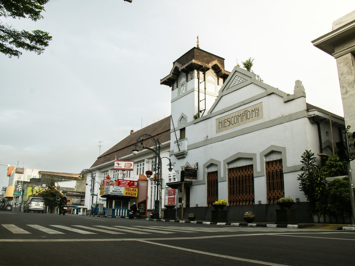 A historic building stands on a quiet street