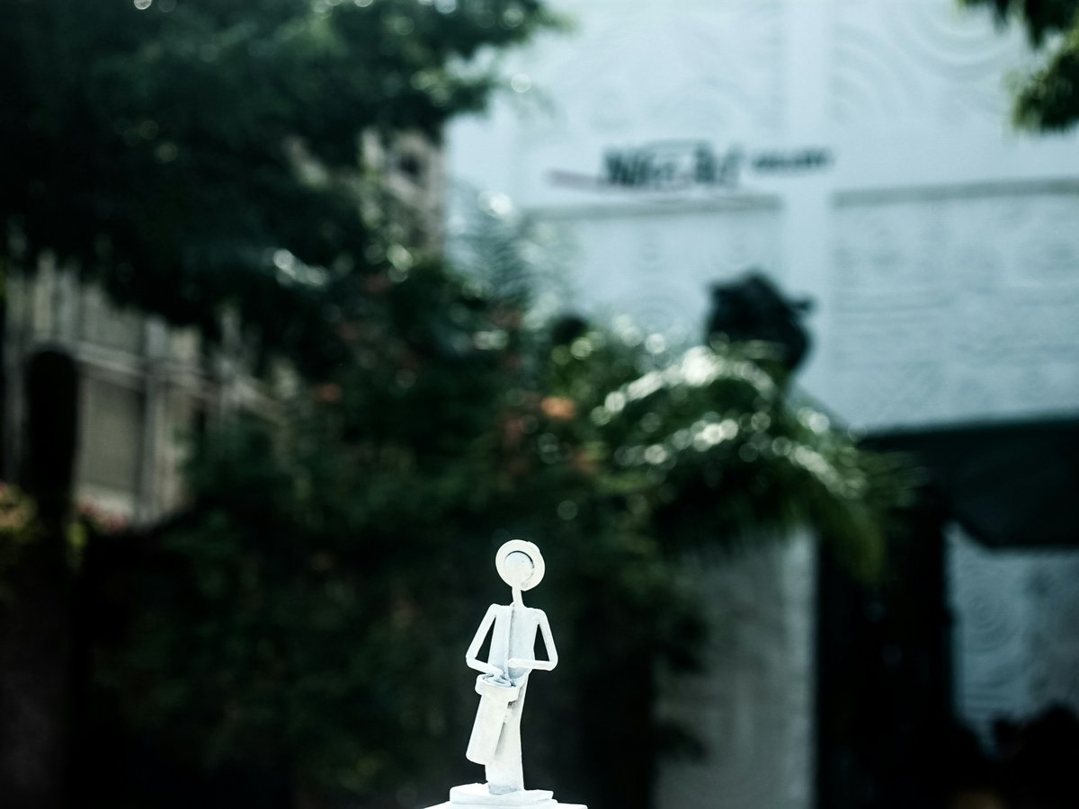 lighted decor of woman holding bag
