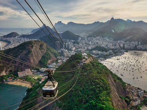 cable cars over the green grass field