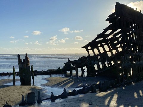 a very large structure sitting on top of a sandy beach