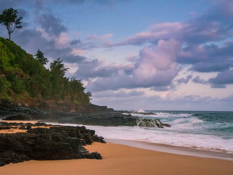 wavy seashore during daytime