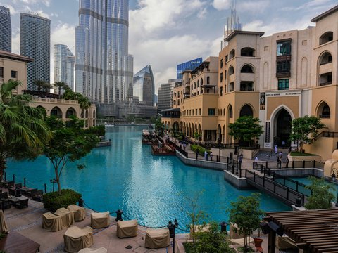 a large swimming pool surrounded by tall buildings
