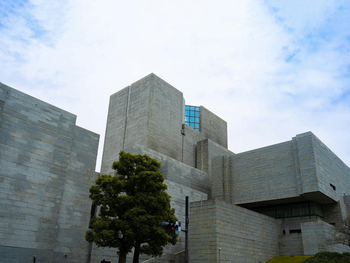 a building with a tree in front