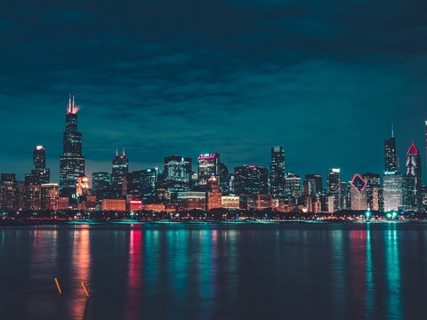 city skyline during night time