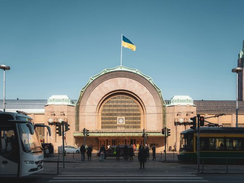 a large building with a flag on top of it