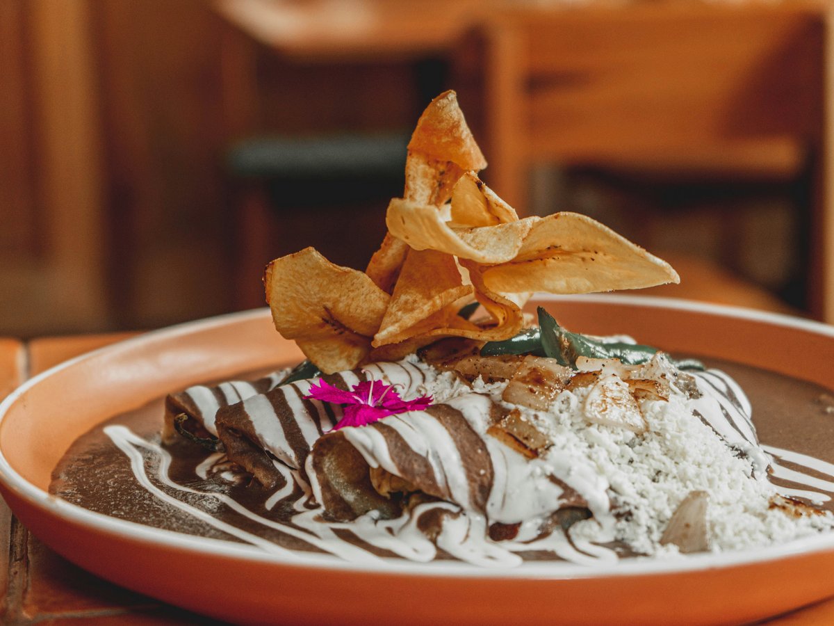 a plate of food on a wooden table