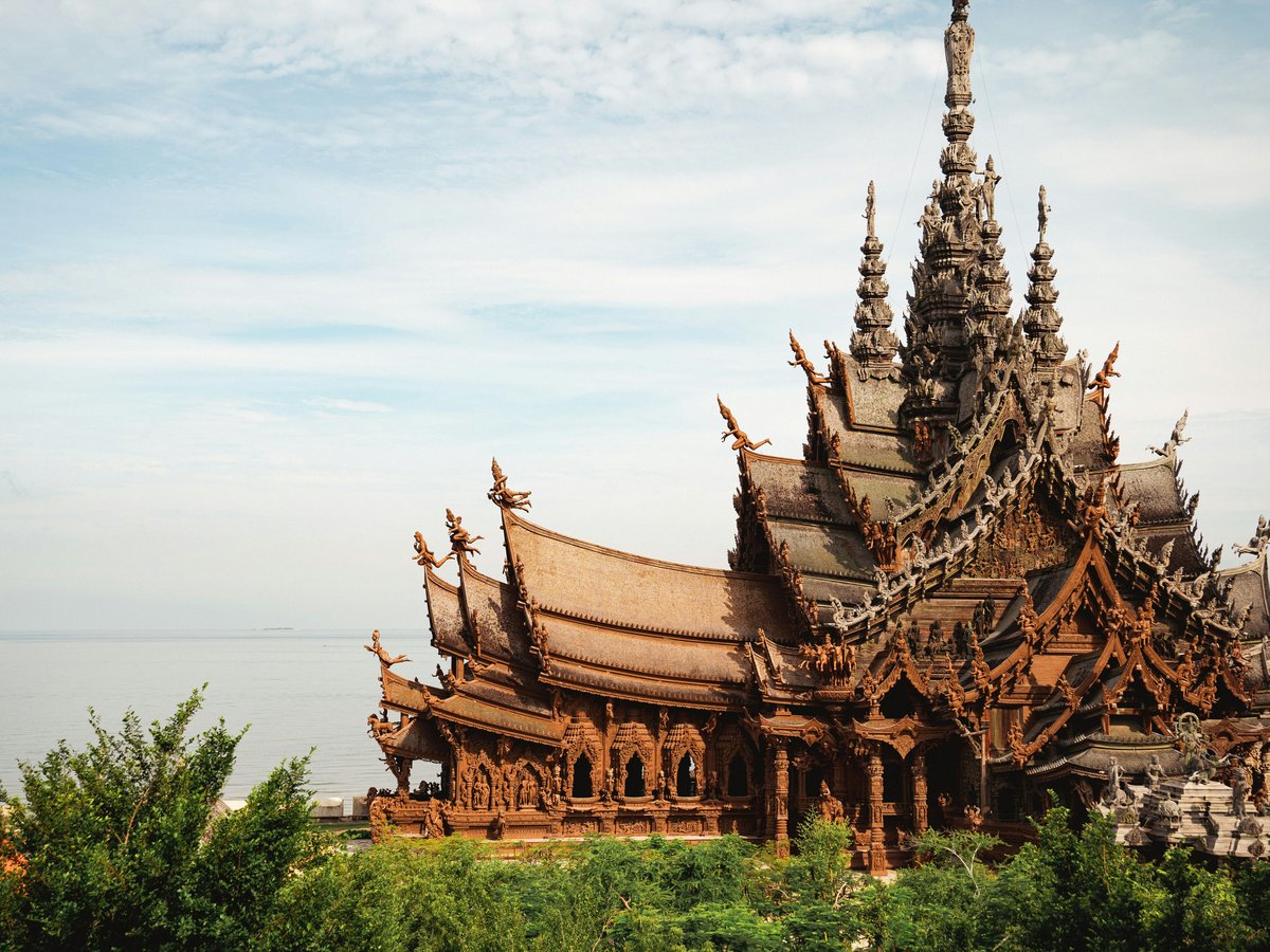 a large wooden building with many spires on top of it