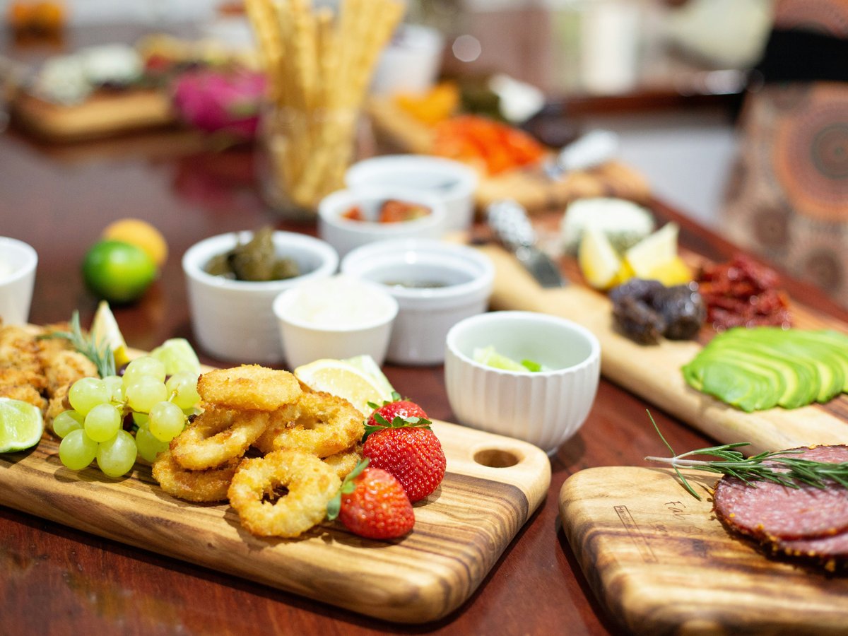 fried food on brown wooden chopping board