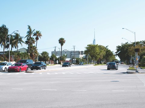 assorted-brand vehicles on the road during daytime