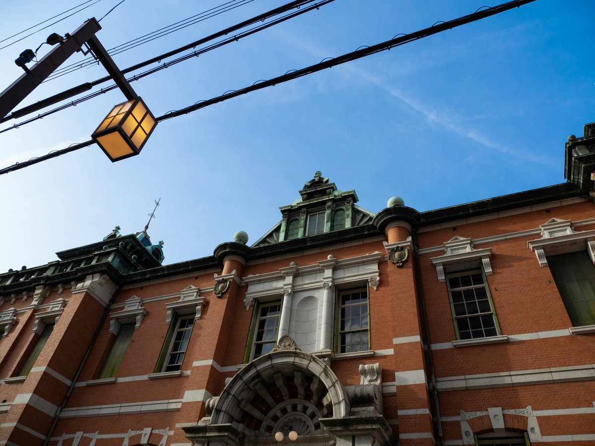a building with a street light in front of it