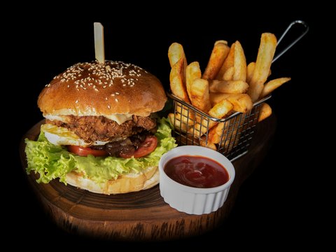 hamburger beside fries and ketchup