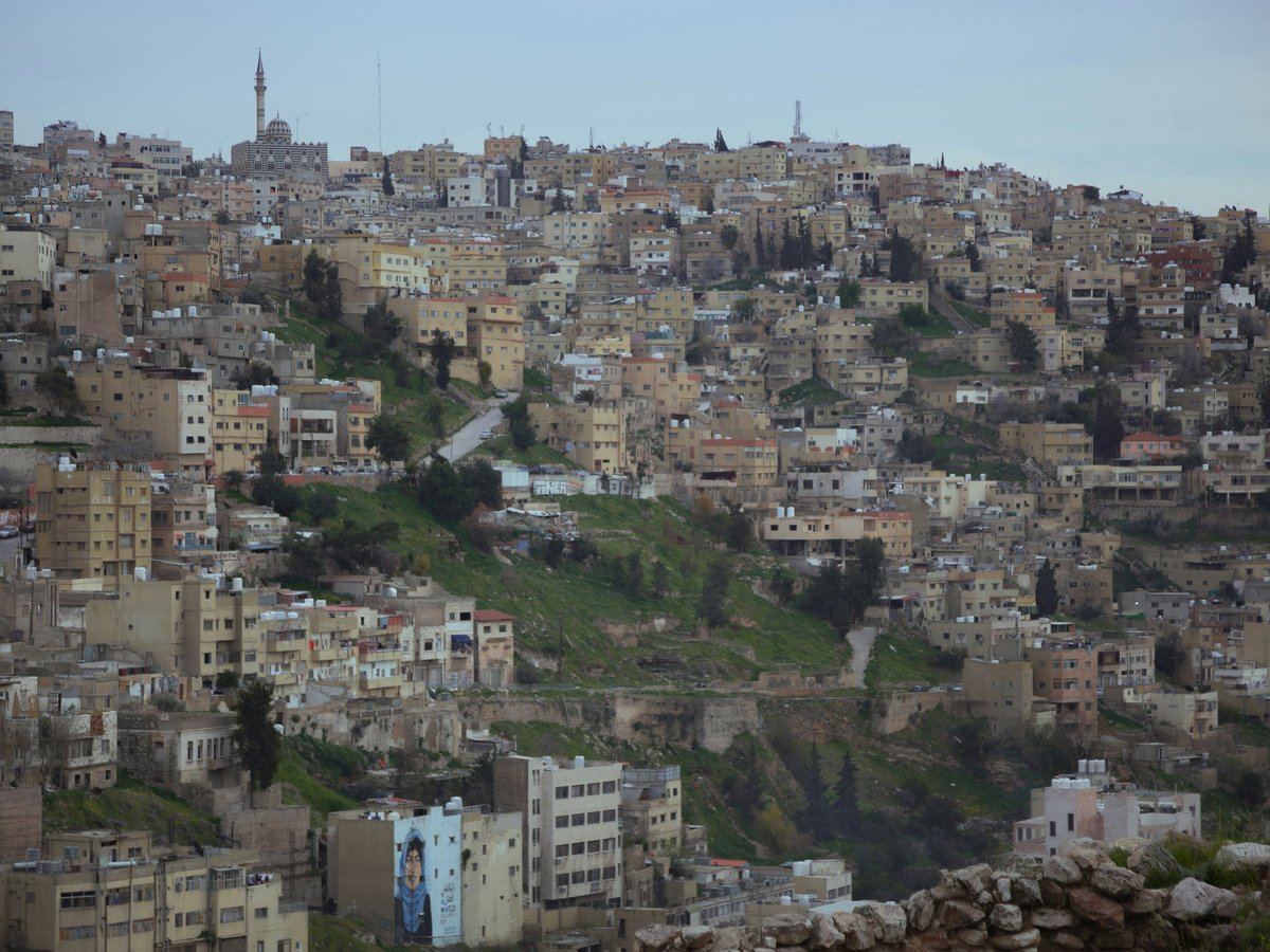 a large city with lots of buildings on top of it