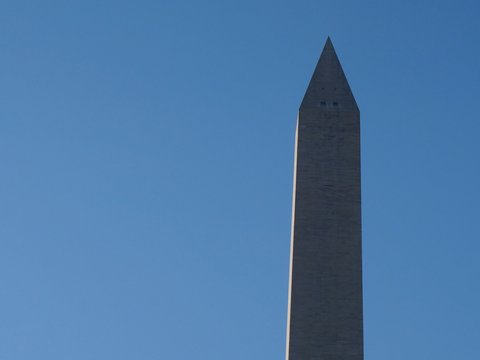 The washington monument against a clear blue sky