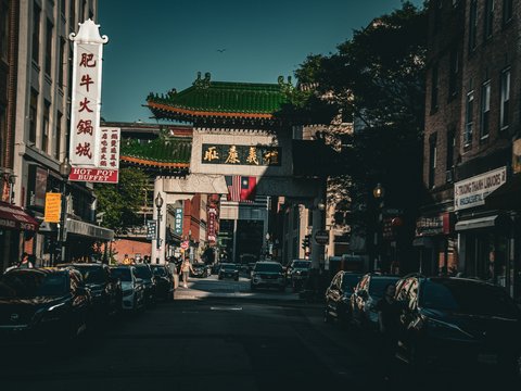 Chinatown gate with cars on street