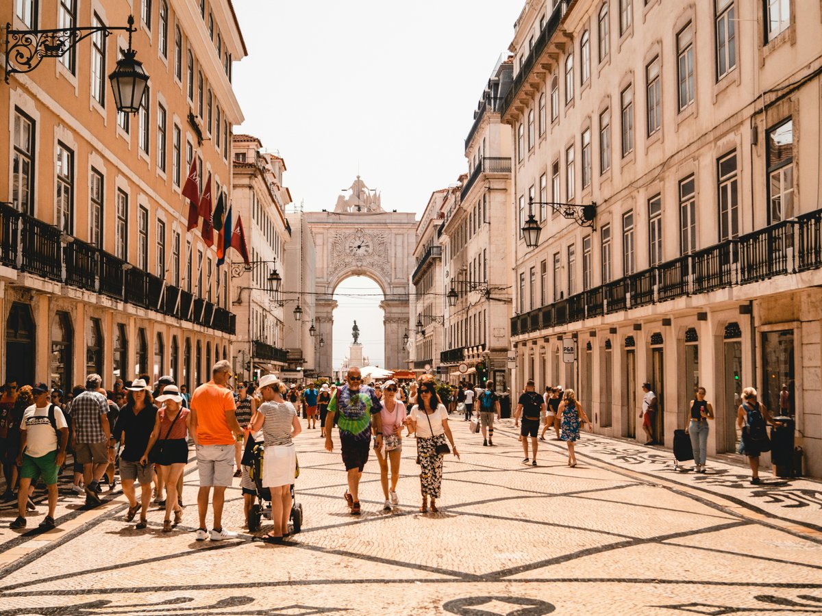 people walking on street near building during daytime