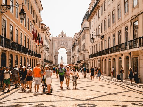 people walking on street near building during daytime