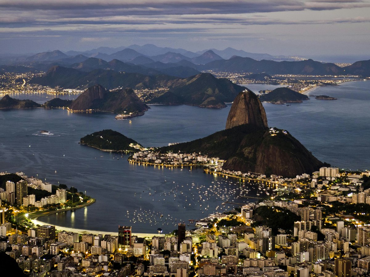 an aerial view of a city at night