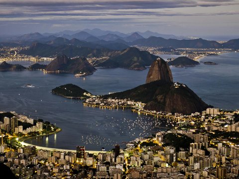 an aerial view of a city at night