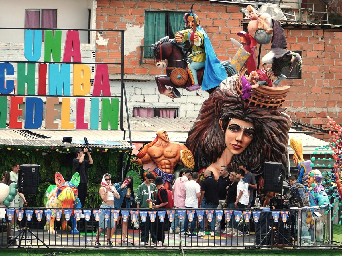 A carnival float with a man dressed as a lion